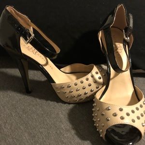 Black and nude studded heels
